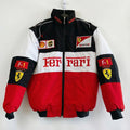 Red, black and white Ferrari F1 racing jacket with sponsor patches and logos, front view.