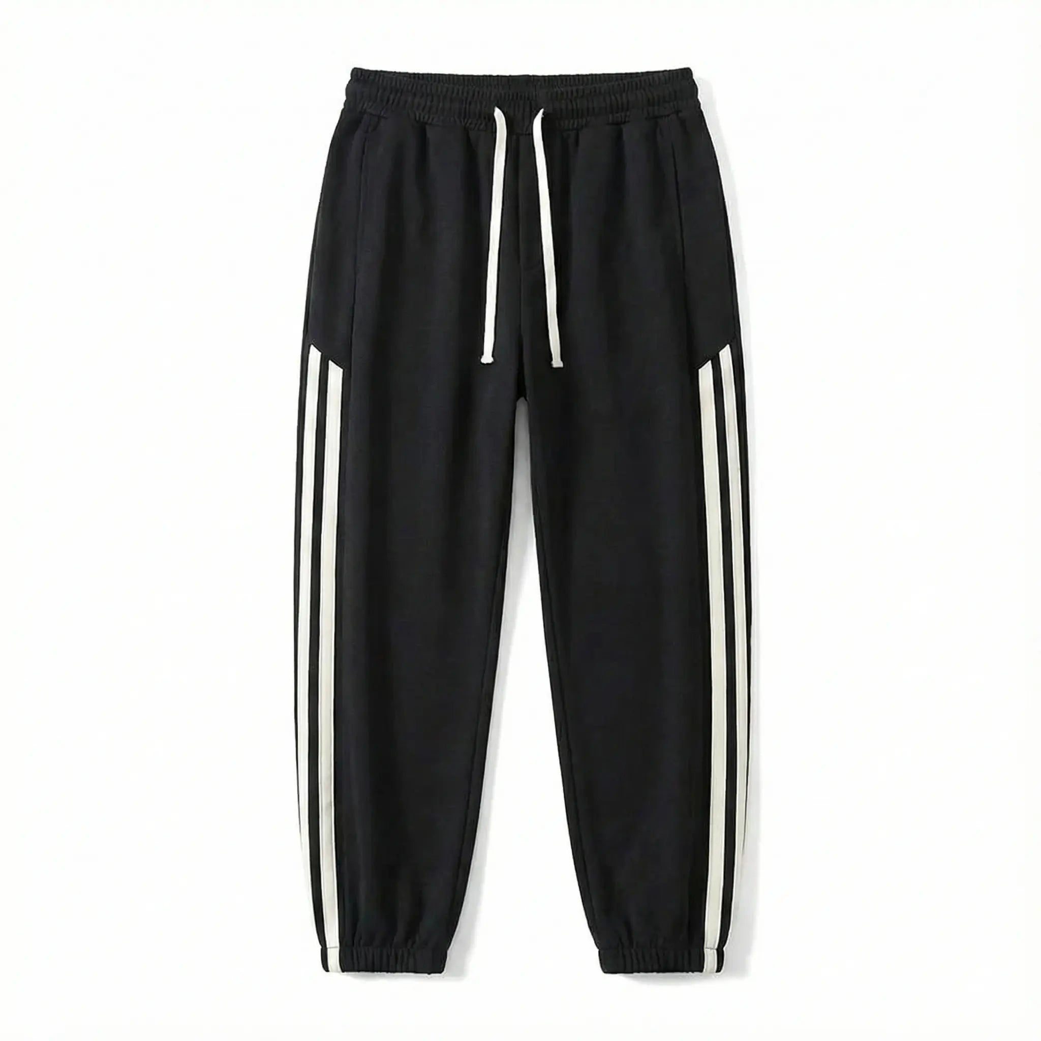 Black streetwear jogger pants with white side stripes and drawstring waist on white background