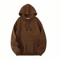 Brown minimalist streetwear hoodie with drawstrings and front kangaroo pocket on white background