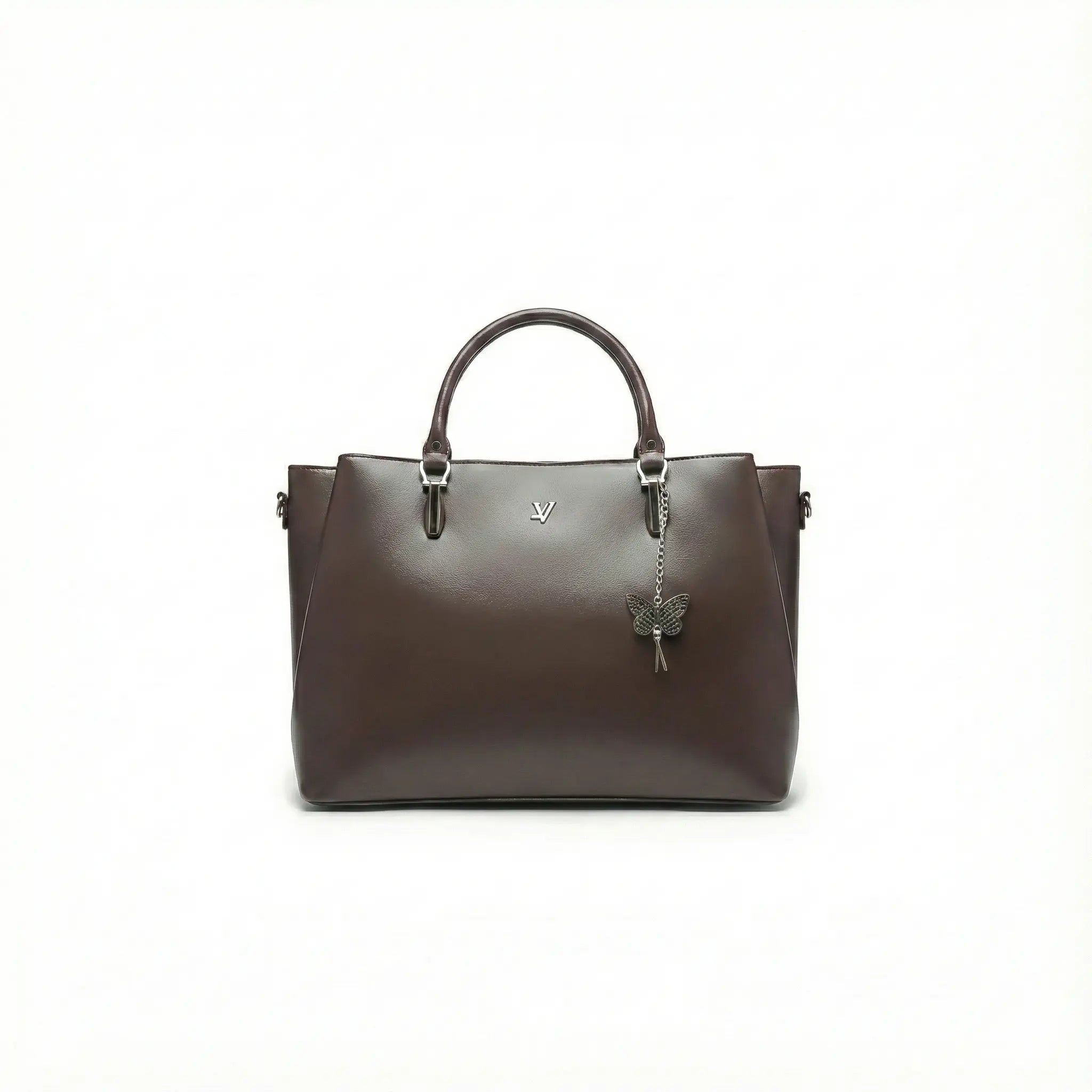 Dark brown leather handbag with top handles and butterfly charm on plain white background