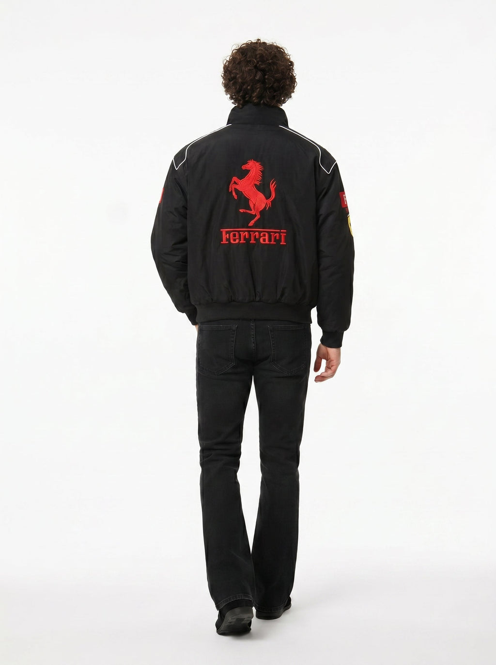 Back view of the Eclatte Ferrari Racing Jacket featuring a large red embroidered Ferrari horse logo and motorsport branding.